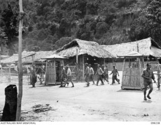 KARAVIA BAY, NEW BRITAIN. 1945-10-25. THE GATES AND GUARD BOXES AT THE ENTRANCE TO THE CHINESE ARMY CAMP