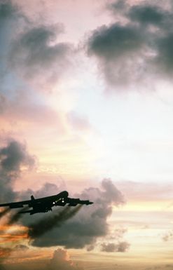 A B-52 Stratofortress aircraft takes off at sunset during Exercise DISTANT MARINER