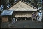 Anne Scheffler and man in front of building