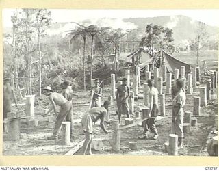 WAREO, PAPUA, NEW GUINEA, 1944-03-29. THE ENLARGEMENT AND ERECTION OF NEW BUILDINGS AT B COMPANY, 4TH FIELD AMBULANCE REST CAMP BY MEMBERS OF THE 4TH FIELD COMPANY, ROYAL AUSTRALIAN ENGINEERS. THE ..