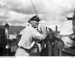 JACQUINOT BAY, NEW BRITAIN. 1944-11-08. LIEUTENANT W.S. PARKINSON, ROYAL AUSTRALIAN NAVAL VOLUNTEER RESERVE NAVIGATOR OF THE RAN FRIGATE BARCOO