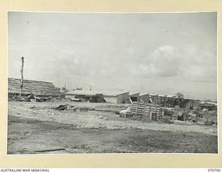 MADANG, NEW GUINEA. 1944-10-31. OFFICES AND STORES SHEDS OF THE RAN ADMINISTRATION STAFF