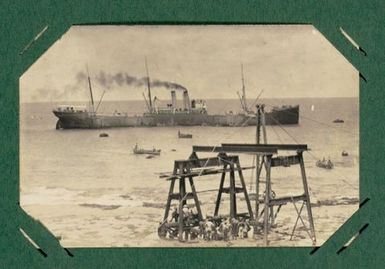 Wharf under construction with ship and lighters in the background.  From the album: Banaba (Ocean Island)
