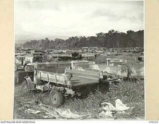 LAE, NEW GUINEA. 1944-09-27. A SECTION OF THE VEHICLE PARK OF THE 43RD FIELD ORDNANCE DEPOT