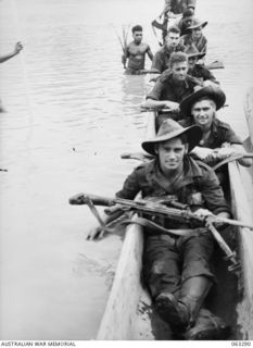 Members of the 2/2nd Commando Squadron who have just returned from an 8 day patrol through Japanese held territory near Bogadjim. Shown are (front to back): Trooper (Tpr) E R Bingham; Tpr Hodson; ..