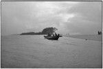 Canoes: men on canoe near sandbank