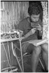 European man with panpipes in Keesing's house