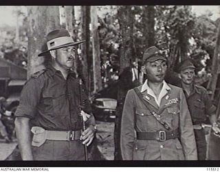 TOROKINA, BOUGAINVILLE. 1945-09-08. LIEUTENANT-GENERAL (LT-GEN) S. G. SAVIGE, GENERAL OFFICER COMMANDING 2 CORPS, ACCEPTED THE SURRENDER OF ALL JAPANESE FORCES ON BOUGAINVILLE FROM LT-GEN M. KANDA, ..