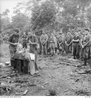 NEW GUINEA. GONA. CHURCH SERVICE BEFORE GOING INTO BATTLE. PADRE J.B. LYNCH. (NEGATIVE BY G. SILK)