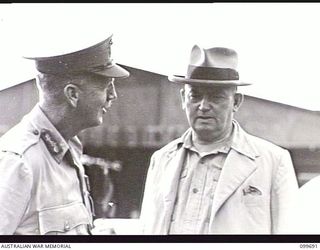 LAE AIRSTRIP, NEW GUINEA, 1946-01-27. LIEUTENANT-GENERAL H. C. H. ROBERTSON, GENERAL OFFICER COMMANDING FIRST ARMY, TALKING TO THE HONOURABLE F. M. FORDE, MINISTER FOR THE ARMY, AT THE AIRSTRIP. MR ..