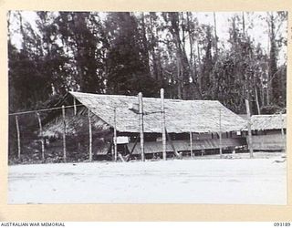 BOUGAINVILLE, 1945-06-18. THE EXTERIOR OF THE SISTERS' MESS, 109 CASUALTY CLEARING STATION, MOTUPENA POINT