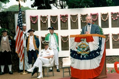 Secretary of the Navy H. Lawrence Garrett III speaks at the naval station's Submarine Memorial during a ceremony to honor the men killed aboard the 52 U.S. Navy submarines lost during World War II. The ceremony is part of the observance of the 50th anniversary of the Japanese attack on Pearl Harbor