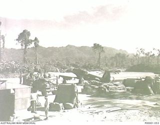 THE SOLOMON ISLANDS, 1945-01-13. A BRISTOL BEAUFORT AND TWO AVRO ANSON AIRCRAFT PARKED WITH STORES AT BOUGAINVILLE ISLAND. (RNZAF OFFICIAL PHOTOGRAPH.)