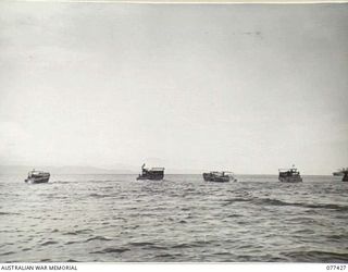 JACQUINOT BAY, NEW BRITAIN. 1944-12-01. A SECTION OF THE BARGE FLEET OF B COMPANY, 594TH ENGINEER BOAT AND SHORE REGIMENT, UNITED STATES ARMY ATTACHED 5TH AUSTRALIAN DIVISION, MOVING OUT INTO THE ..
