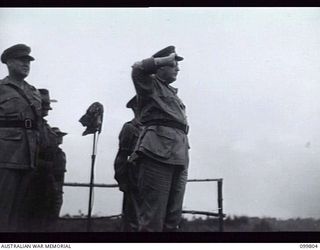 VUNAKANAU, NEW BRITAIN, 1946-02-12. FIRST FULL REGIMENTAL PARADE OF THE PACIFIC ISLANDS REGIMENT AS ONE COMPLETE UNIT. UNTIL THE WAR ENDED COMPANIES AND PLATOONS SERVED IN MANY DIFFERENT AREAS. ..