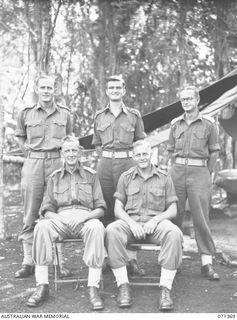 KILIGIA, NEW GUINEA. 1944-03-16. QX36344 BRIGADIER G.V. MORIARTY, MC, VD, COMMANDER ROYAL ARTILLERY (4), WITH HIS OFFICERS AT HEADQUARTERS, ROYAL AUSTRALIAN ARTILLERY, 5TH DIVISION. IDENTIFIED ..