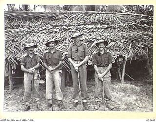 KARAPIA, NEW GUINEA, 1945-08-17. OFFICERS OF D COMPANY, 2/7 INFANTRY BATTALION. THEY ARE LT B.L. CUTLER, SIGNAL OFFICER (1); LT A. ROBERTSON, OC D COMPANY (2); LT C.R.G. SWAN, 2I/C D COMPANY (3); ..