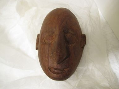 carved head