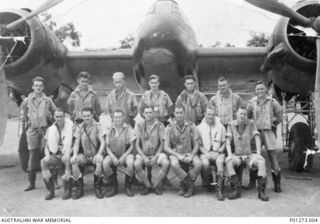 Port Moresby, Papua. 1942. Aircrew of `A' Flight, No. 30 Squadron RAAF, in front of one of the squadron's Beaufighter aircraft. Left to right: Standing: Flight Sergeant (Flt Sgt) Nelson, Sergeant ..