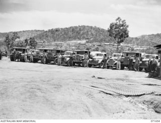 PORT MORESBY, NEW GUINEA, 1944-03-29. WATER TRANSPORT VEHICLES AT TRANSPORT SECTION, HEADQUARTERS NEW GUINEA FORCE. IDENTIFIED PERSONNEL ARE: NX79245 LANCE CORPORAL A. CONNELLY (1); NX128907 DRIVER ..