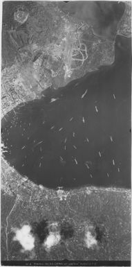 [Aerial photographs relating to the Japanese occupation of Rabaul and vicinity, Papua New Guinea, 1943] [Simpson Harbour and Tavurvur volcano]. (32)