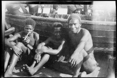 Men seated beside  Balangot, Awar, New Guinea, 1935 / Sarah Chinnery