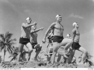 AITAPE, NORTH EAST NEW GUINEA. C. 1945-04. SINCE THE RAAF ORGANISED SURF PATROLS ALONG THE NORTH NEW GUINEA COAST, MANY LIVES HAVE BEEN SAVED. WITHIN TEN DAYS OF THE FORMATION OF THIS PATROL, ..