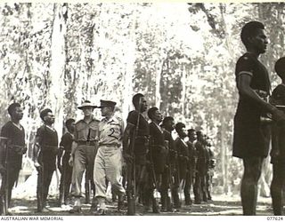 KAMALGAMAN ANCHORAGE, JACQUINOT BAY, NEW BRITAIN. 1944-12-23. VX27 MAJOR-GENERAL A.H. RAMSAY, CB, DSO, ED, GOC, 5TH DIVISION (2) ACCOMPANIED BY N451275 LIEUTENANT J.H. THECKSTON (1) WHILE ..