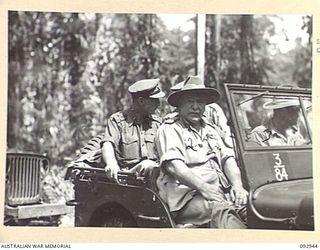 BOUGAINVILLE. 1945-06-08. GENERAL SIR THOMAS A. BLAMEY, COMMANDER-IN-CHIEF, ALLIED LAND FORCES, SOUTH WEST PACIFIC AREA (2), IN A JEEP DURING HIS VISIT TO 15 INFANTRY BRIGADE, 3 DIVISION