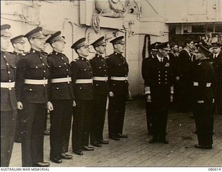 Scapa Flow, Scotland. 1943-08-16. King George VI on board HMS Shropshire before the cruiser sailed for the Pacific. The British Government offered, and the Australian Government accepted, the ..