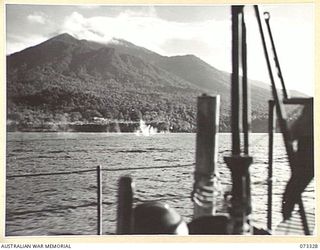 KARKAR ISLAND, NEW GUINEA. 1944-05-18. OERLIKON SHELLS RICOCHET OFF THE WATER DURING THE SHELLING OF JAPANESE SHORE INSTALLATIONS BY ONE OF HMA MORTAR LAUNCHES FROM A RANGE OF APPROXIMATELY 800 ..