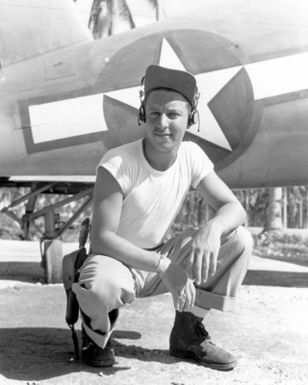 World War II (WWII) area photograph of US Marine Corps (USMC) First Lieutenant (1LT) Harold E. Segal taken at Russell Islands July 17, 1943. 1LT Segal is an Ace Pilot credited with 12 kills. His home is 782 Woodmere Avenue, Long Island, New York