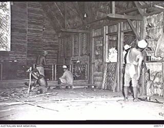 RABAUL, NEW BRITAIN, 1946-01-17. THE INTERIOR OF THE CHURCH OF ENGLAND CHAPEL, MALAGUNA ROAD, WHICH IS BEING BUILT FOR CIVILIANS BY A JAPANESE WORKING PARTY