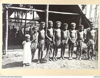 WUNUNG, JACQUINOT BAY, NEW BRITAIN, 1945-08-25. A GROUP OF CHILDREN AT THE SING-SING HELD AT THE ALLIED INTELLIGENCE BUREAU TO MARK THE END OF HOSTILITIES