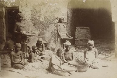 Slaves sifting root of Samoa plant