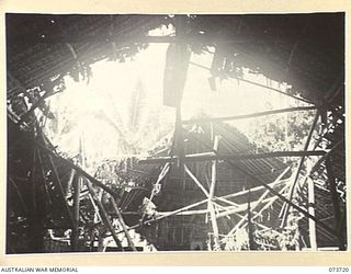 KARKAR ISLAND, NEW GUINEA. 1944-06-02. THE INTERIOR OF THE BOMB DAMAGED TABEL MISSION WHICH HAS RECENTLY BEEN CAPTURED BY MEMBERS OF THE 37/52ND INFANTRY BATTALION