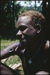 Portrait of young man with pipe
