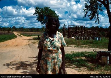 Aboriginal woman holding a hat