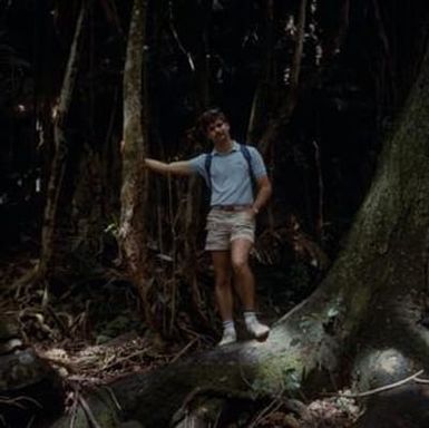 [Unidentified man with unidentified plants in Kauai, United States]