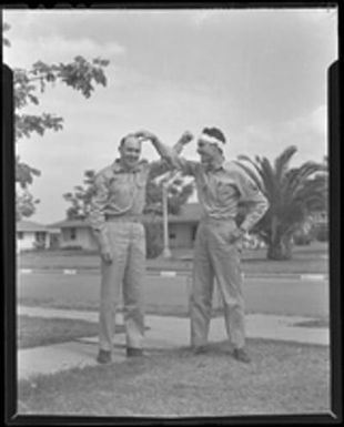 [Lee Embree and serviceman at Hickam Field]