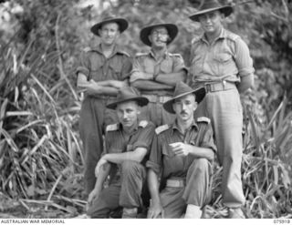 HANSA BAY, NEW GUINEA. 1944-09-06. OFFICERS OF C COMPANY, 25TH INFANTRY BATTALION AT THEIR CAMP AT BOT BOT. IDENTIFIED PERSONNEL ARE: NX128782 CAPTAIN C.P. GABEL (1); VX102775 CAPTAIN E.J. ..