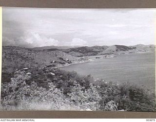 1940-02-28. NORTH OF PORT MORESBY - COASTAL VISTA - OCEAN SIDE. RAAF SURVEY FLIGHT. (NEGATIVE BY N. TRACY)