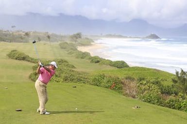 Barack Obama plays golf with Prime Minister Najib Razak, Joe Paulsen, and Mike Brush in Kaneohe Bay, Hawaii, December 24, 2014