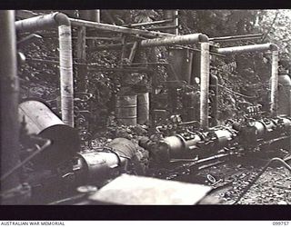 RABAUL, NEW BRITAIN, 1946-01-21. JAPANESE NAVAL COMPRESSOR STATION ON TAWUI POINT. THE INSTALLATION PRODUCED COMPRESSED AIR WHICH WAS USED FOR FILLING TORPEDOES