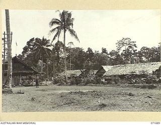 LAE, NEW GUINEA. 1944-03-25. THE ADMINISTRATION BUILDINGS AND MEDICAL OFFICES AT AUSTRALIAN NEW GUINEA ADMINISTRATIVE UNIT HEADQUARTERS