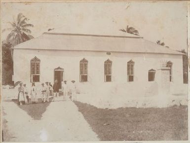 Reverend and Mrs Hutchin and others standing outside Ngatangiia Church. From the album: Cook Islands