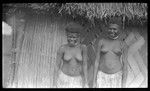 Young women outside a house