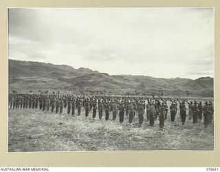 WAWIN, MARKHAM VALLEY, NEW GUINEA. 1944-10-24. TROOPS OF THE 3RD DIVISION LINED UP FOR AN INSPECTION BY NX4 BRIGADIER B.E. KLEIN, COMMANDER ROYAL ARTILLERY, 3RD AUSTRALIAN DIVISION