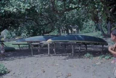 [Outrigger canoes on the shore in Safotu, Samoa]