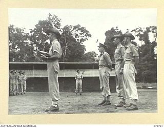 1944-06-08. SX24860 LIEUTENANT-COLONEL H.R.D. MCEWAN, DEPUTY DIRECTOR OF MECHANICAL ENGINEERING (1), ADDRESSING TROOPS ON THE PARADE GROUND AT THE 2/7TH ADVANCED WORKSHOP AFTER AN INSPECTION OF THE ..